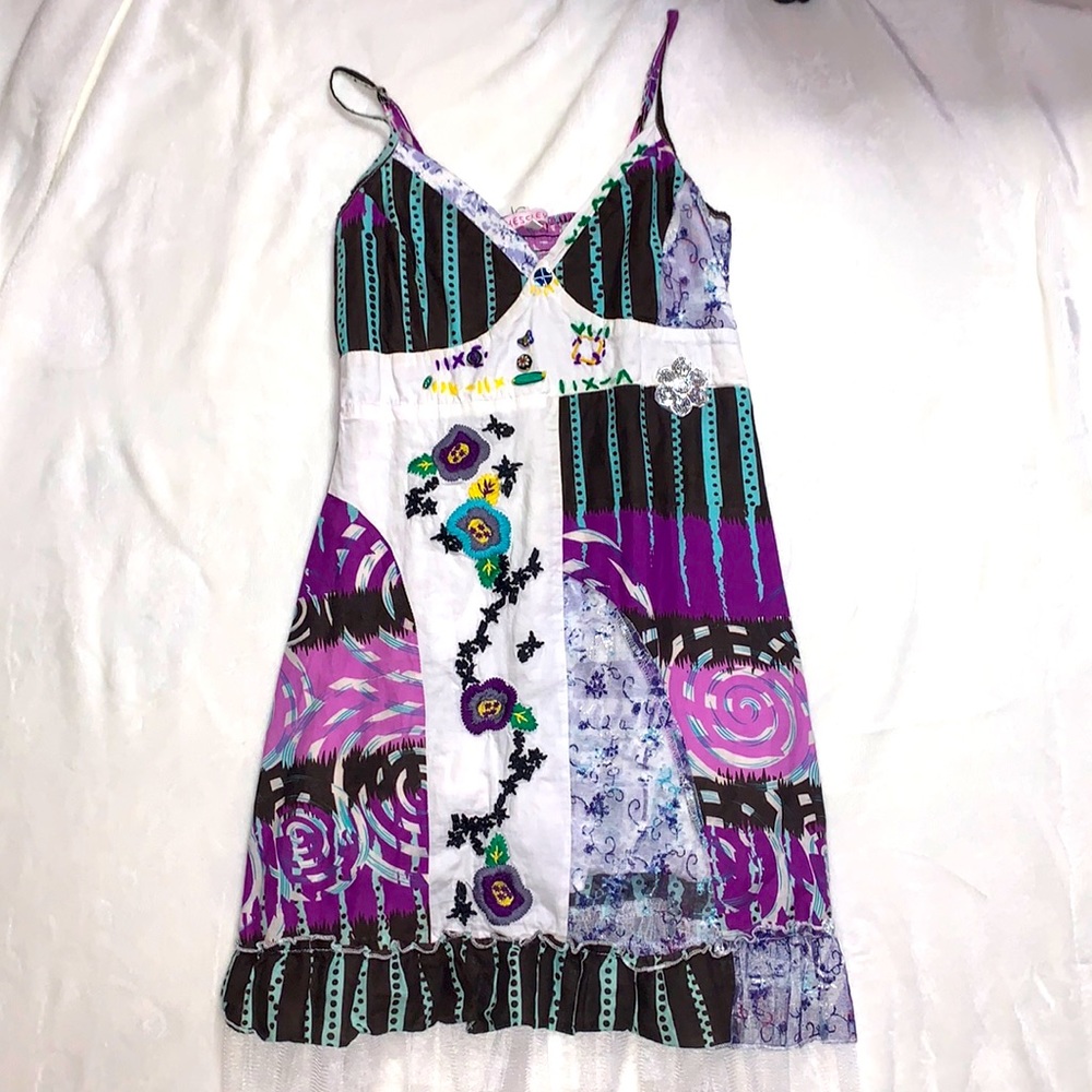 Handcrafted lace and cloth dress. One of a kind.